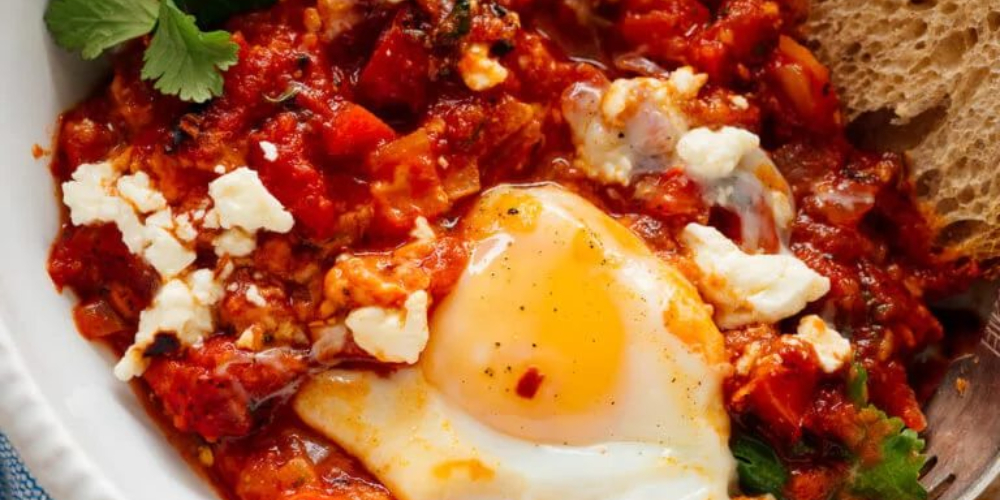 Shakshuka eggs – eggs poached in a tomato and pepper stew